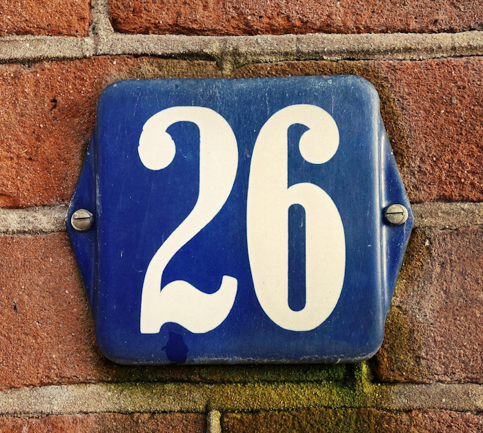 Elegant husskylt i gammaldags stil, perfekt för att ge huset en unik och välkomnande känsla